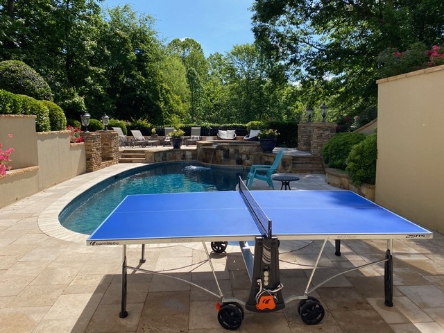 Cornilleau 250S ping pong table at pool